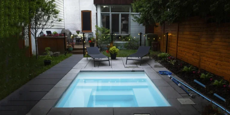 Small, elegant outdoor plunge pool with multiple steps
