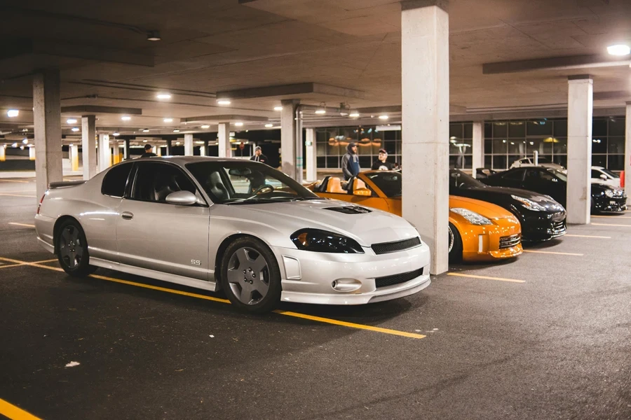 Sport car on illuminated parking lot