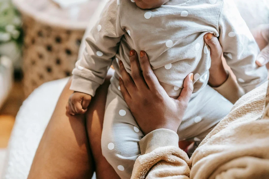 Woman Holding a Baby