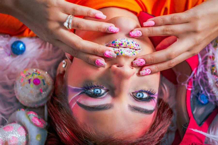 Woman in pink and white short nails