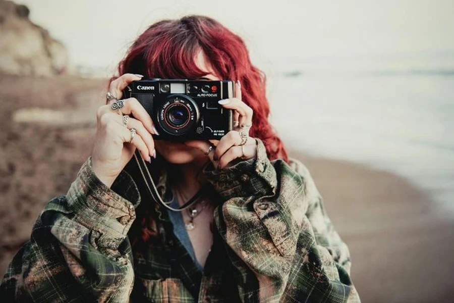 Woman wearing faded tartan jacket