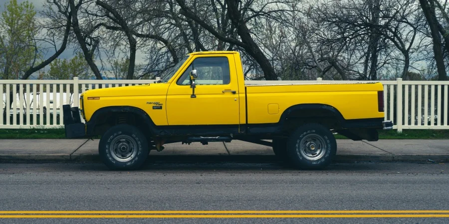 Yellow Truck Parked on the Road