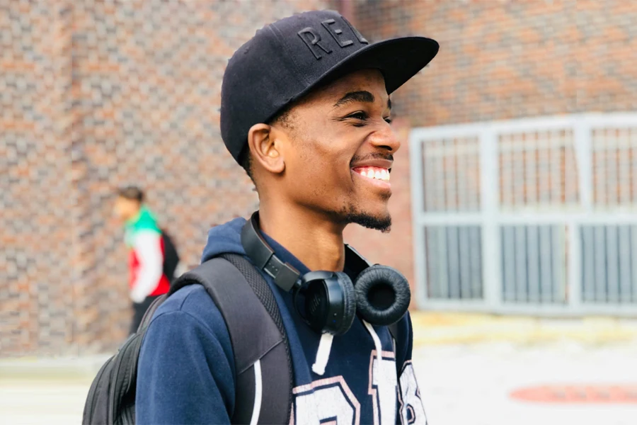 Young man in a high profile trucker hat