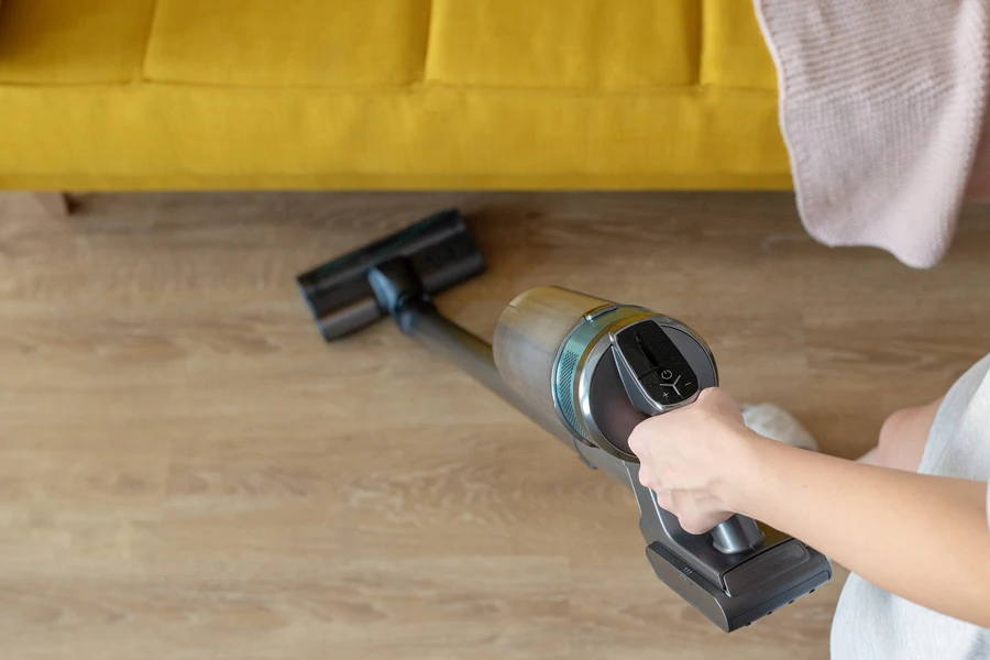 a cordless vacuum cleaner on a car seat