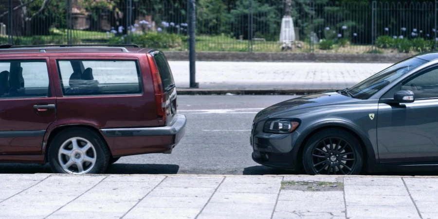 a couple of cars parked next to each other