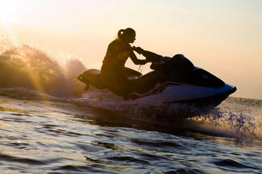 a girl riding a jetski