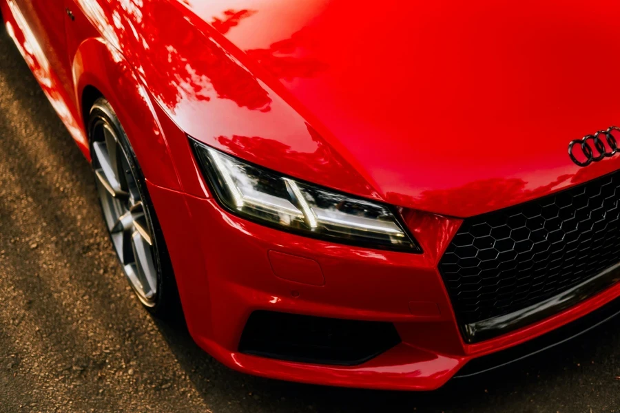 a red car parked on the side of the road