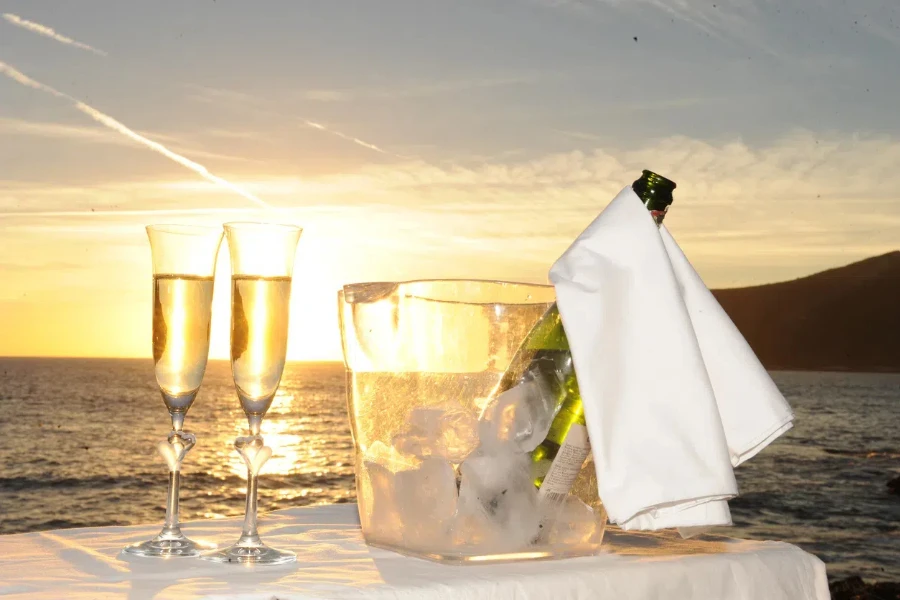 Crystal ice bucket at outdoor dining along the beach