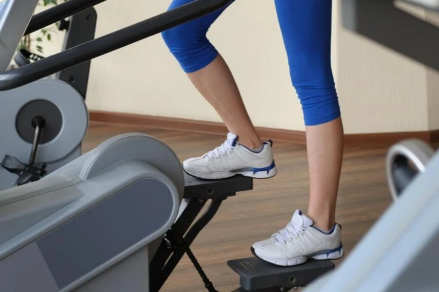 girl doing step machine workout