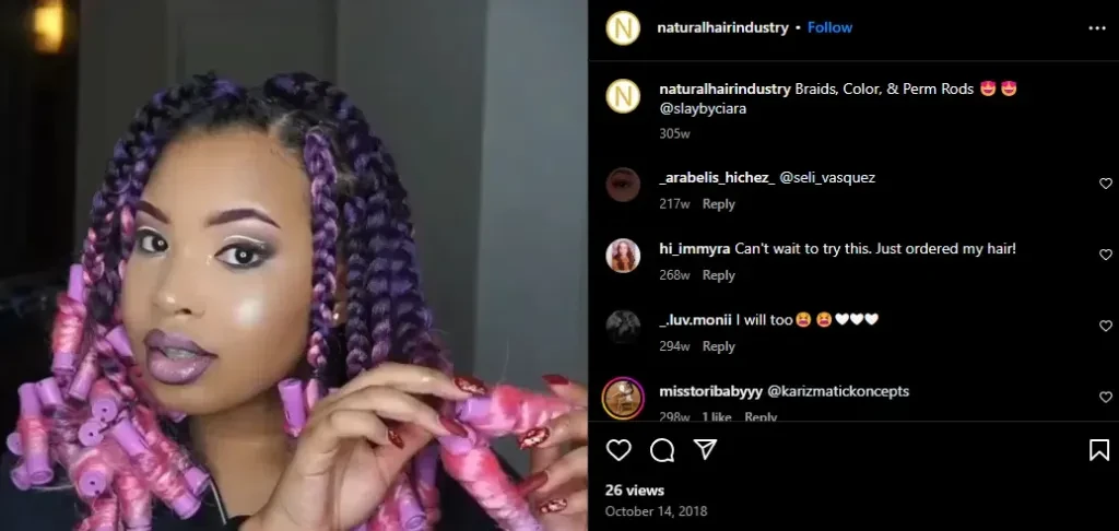 Lady flaunting her beautiful pink Barbiecore braids