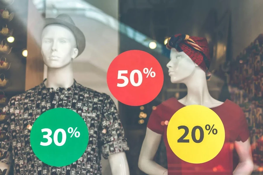 Male and female mannequin with sales tags