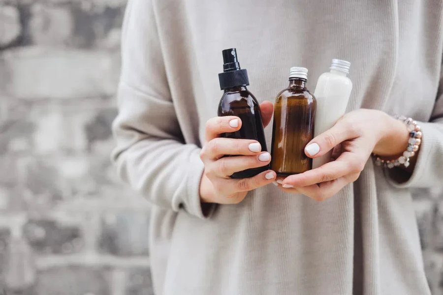 Person holding a variety of moisturizing products