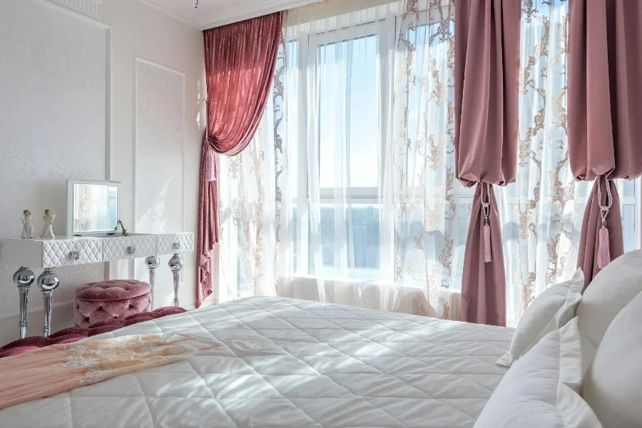 pink velvet curtains with white chiffon curtains in a bedroom