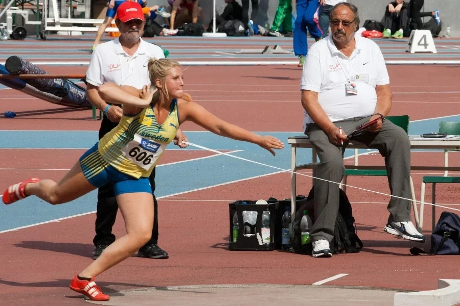 Professional athlete about to throw shot put