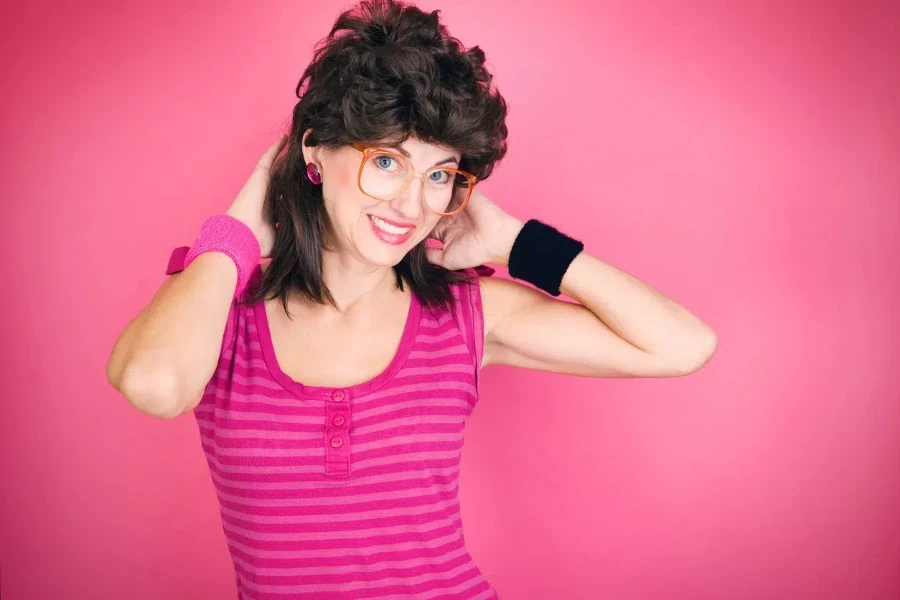 Women in pink with a mullet