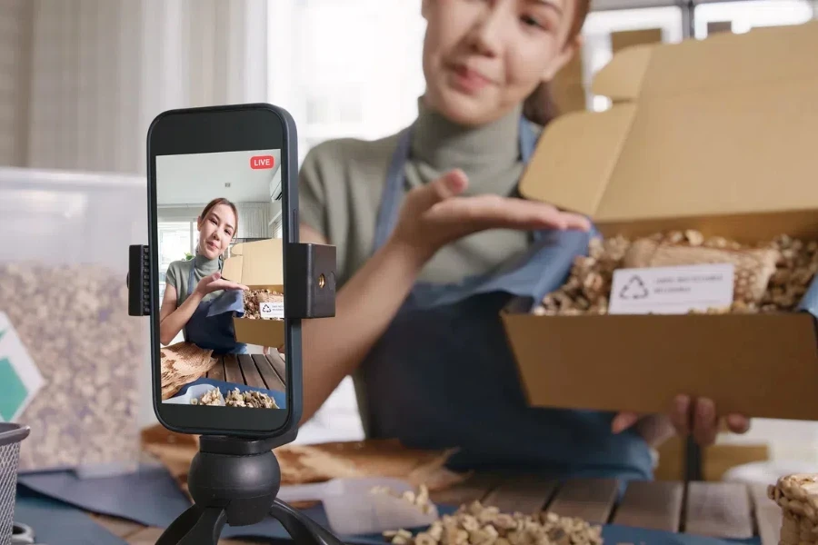 Young woman recording a video for TikTok and Instagram Shop