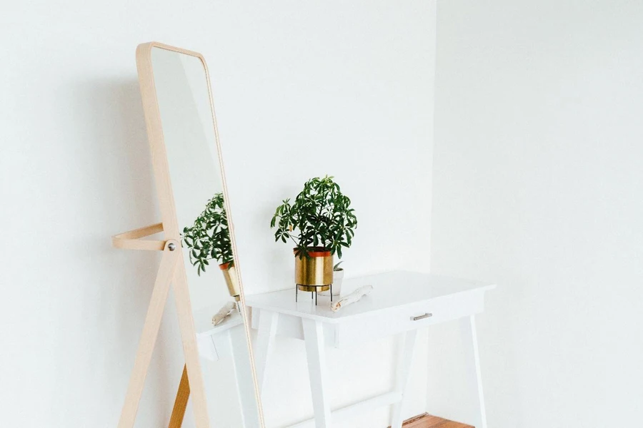 A Cheval Mirror besides a table