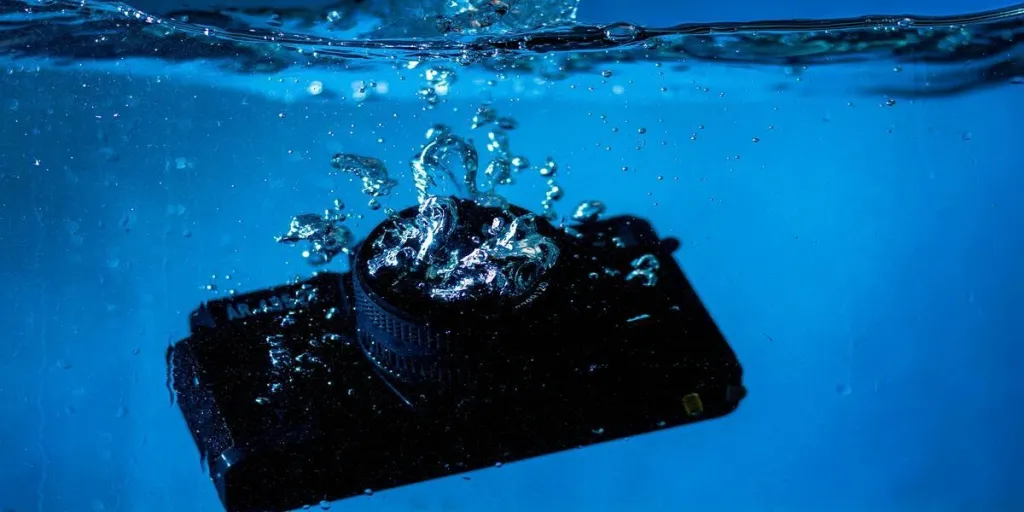 A close-up photo of a camera underwater