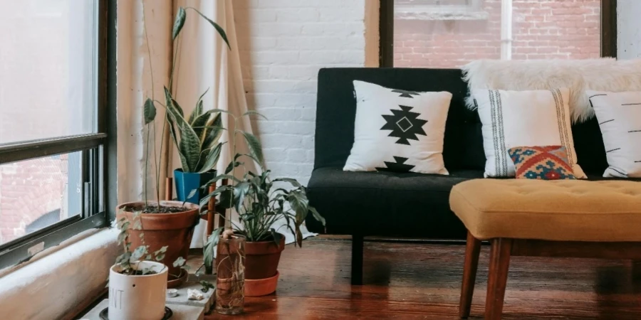 A couch and plants in a room