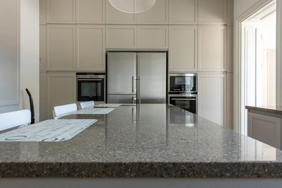 A kitchen with granite countertops