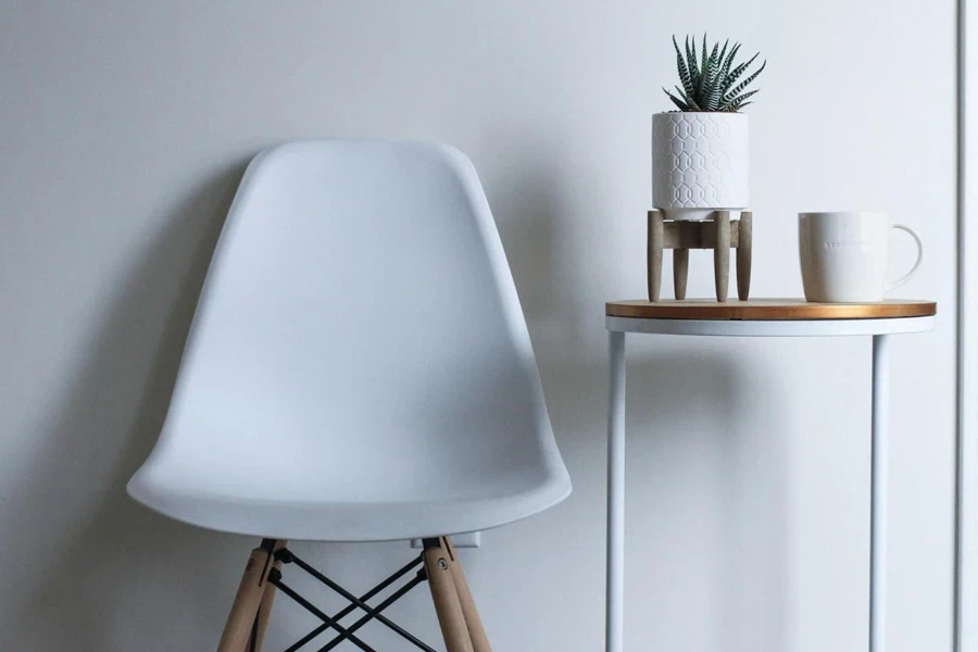 A minimalist coffee table and chair create cozy coffee settings.