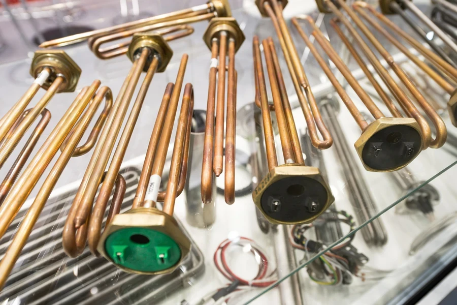 A set of copper tubular immersion heaters