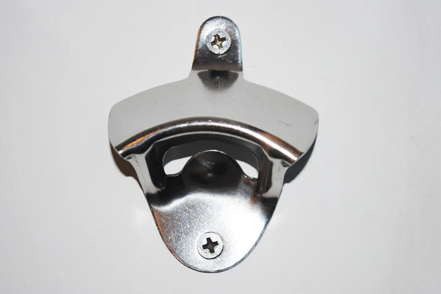 A wall-mounted metal bottle opener