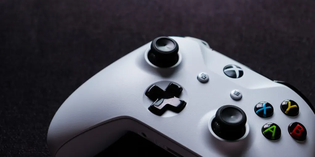 A white Xbox controller on a gray background