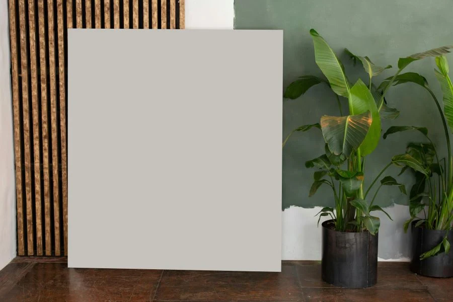 A white board next to a sage green wall