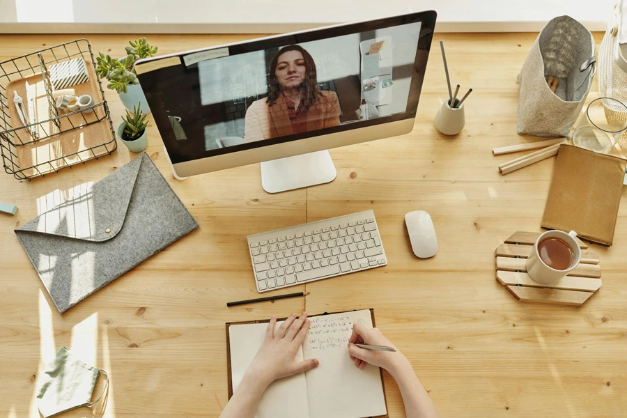 A woman on video call on a desktop