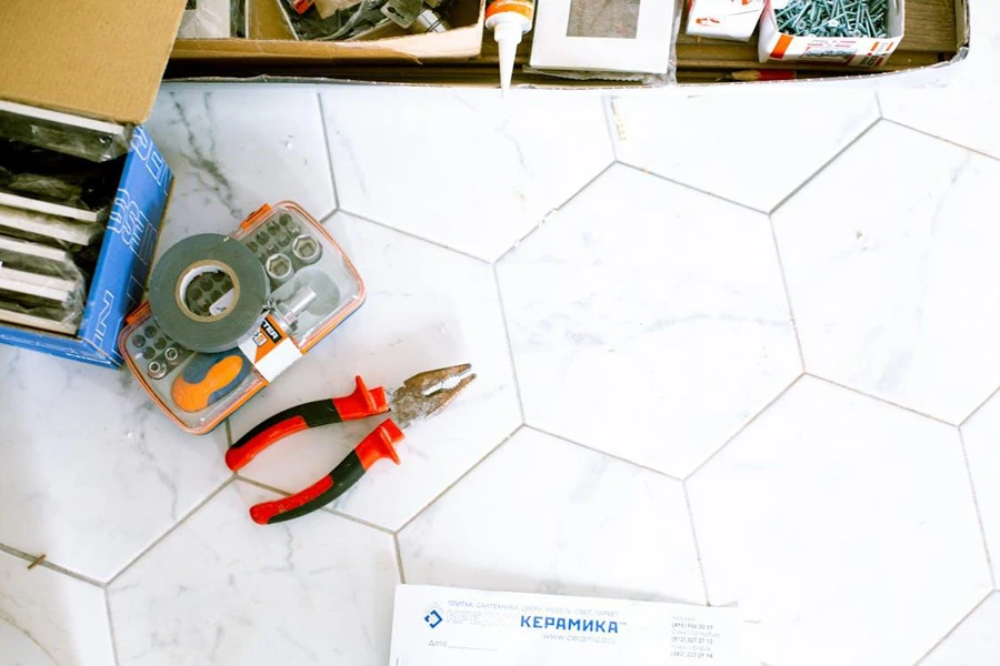 Aerial view of floor tiles being installed