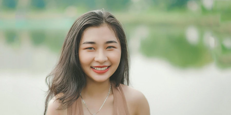 Close-Up Photography of A Girl Smiling