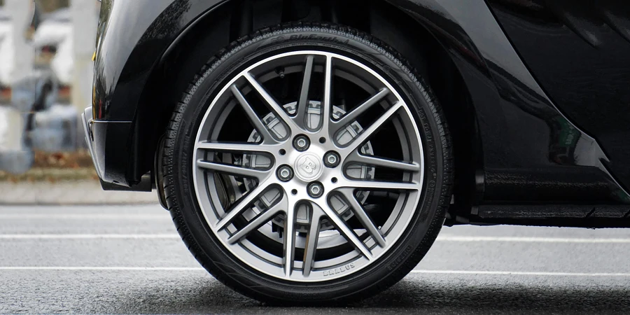 Close-up Photograph of Chrome Vehicle Wheel