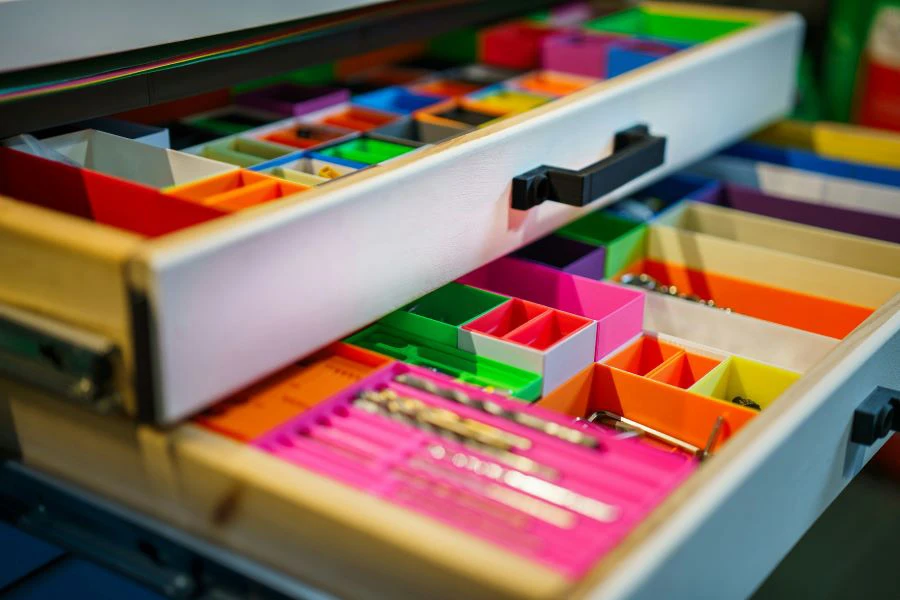 Close-up photo of a drawer with different color organizers