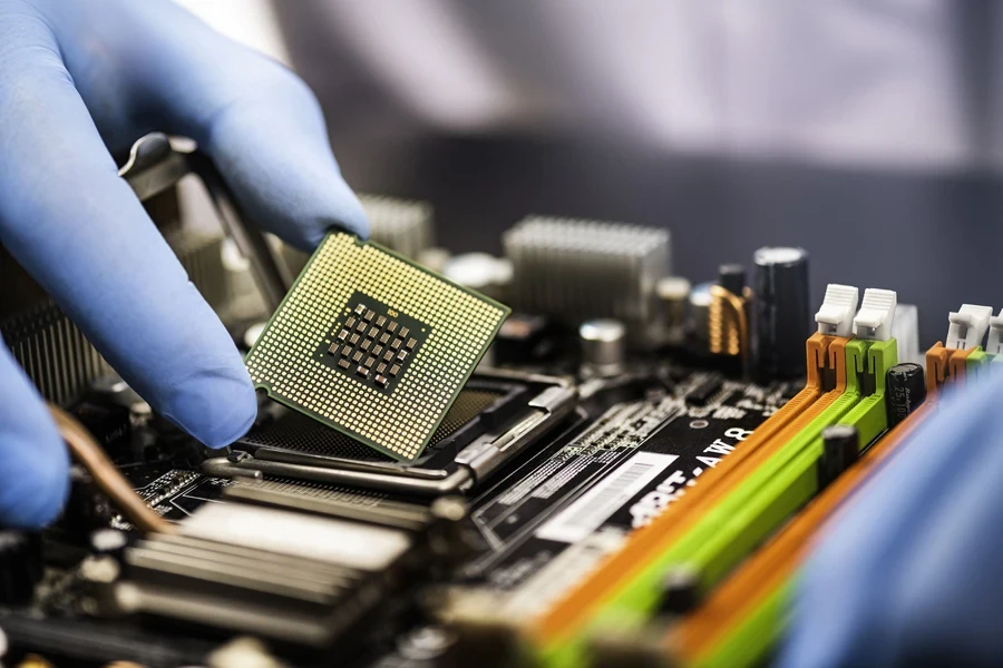 Computer technician servicing a CPU