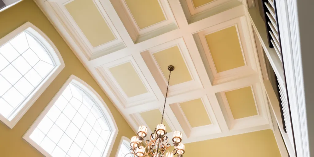 Contrasting white and yellow coffered ceiling