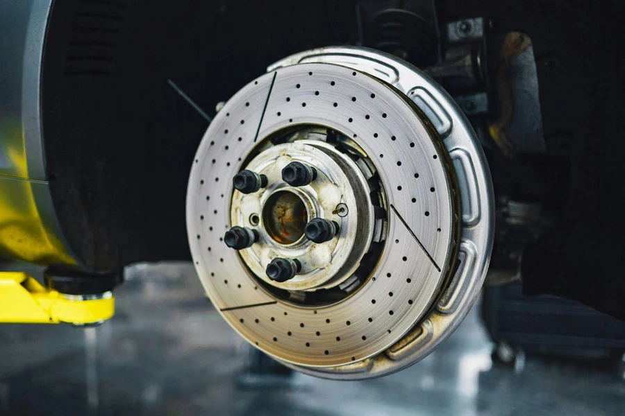 Disk brake in car service workshop