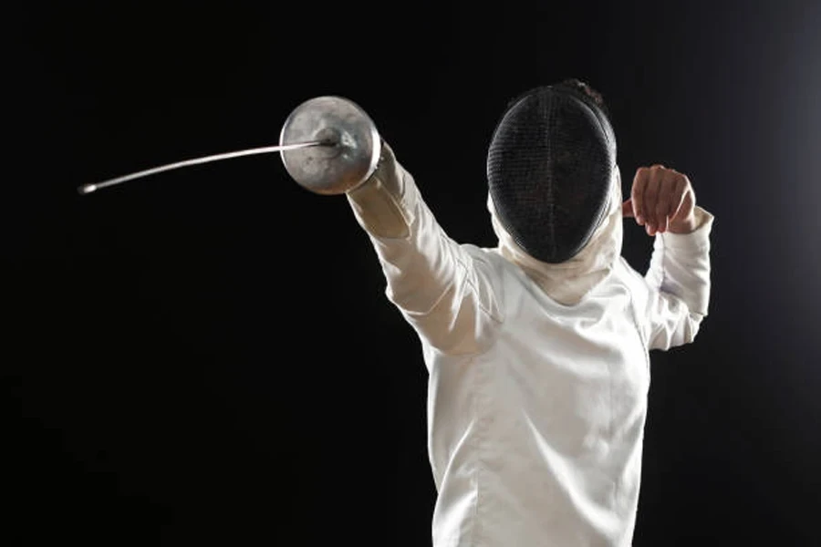 Fencer a holding sword during combat