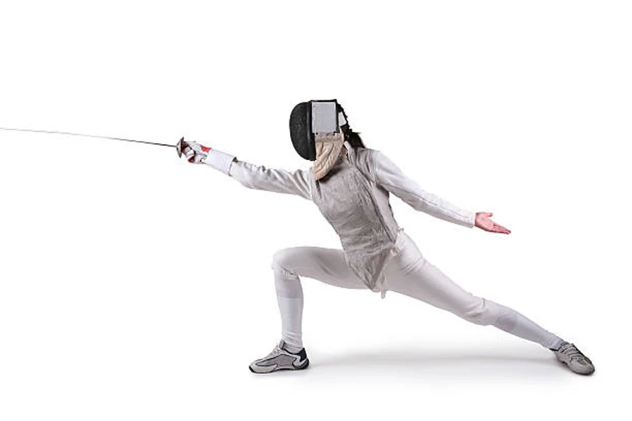 Fencer wearing leather fencing gloves while performing a lunge