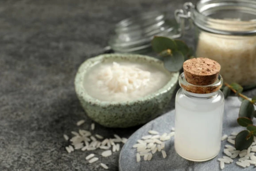 Glass Bottle with Rice Water and Grains