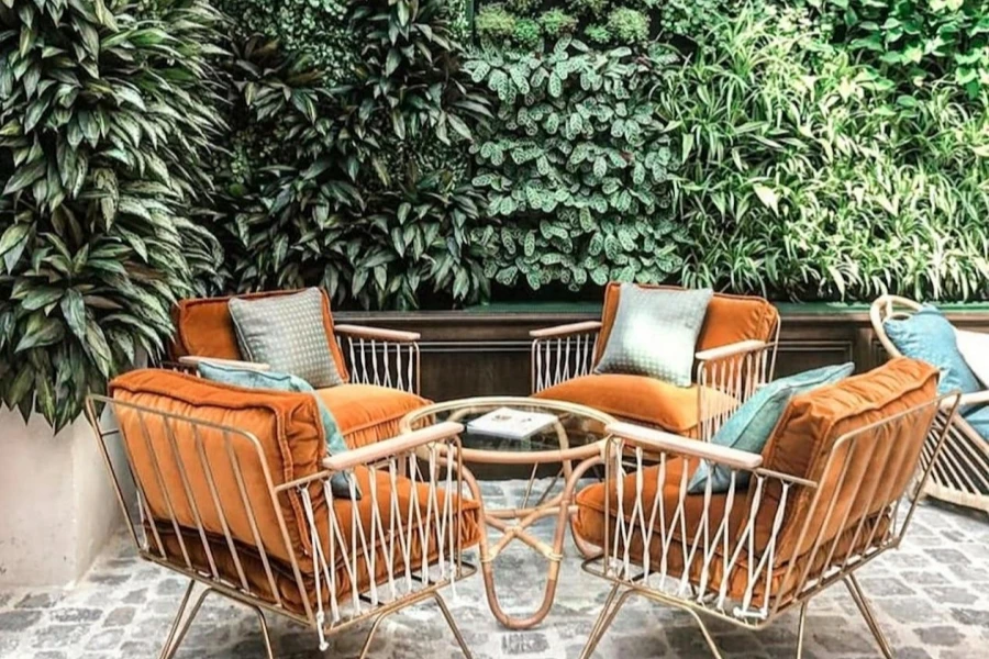 Greenery such as plant walls are popular patio design choices