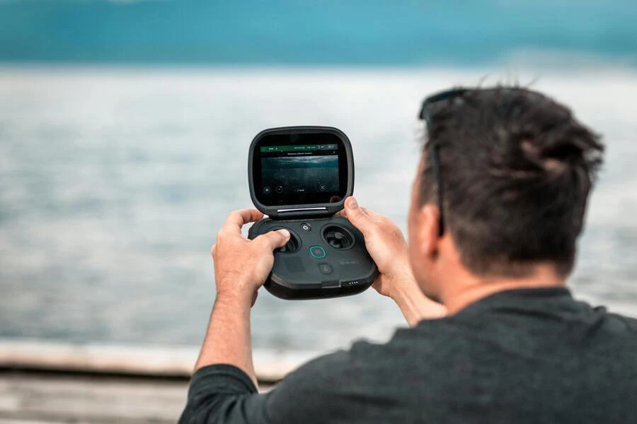 Man operating an underwater camera