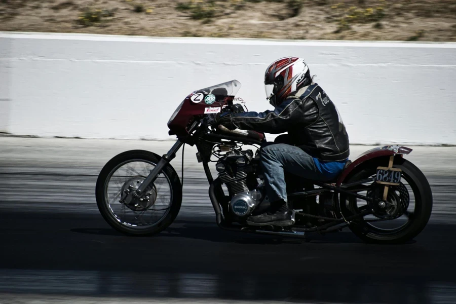 Man riding motorcycle with helmet