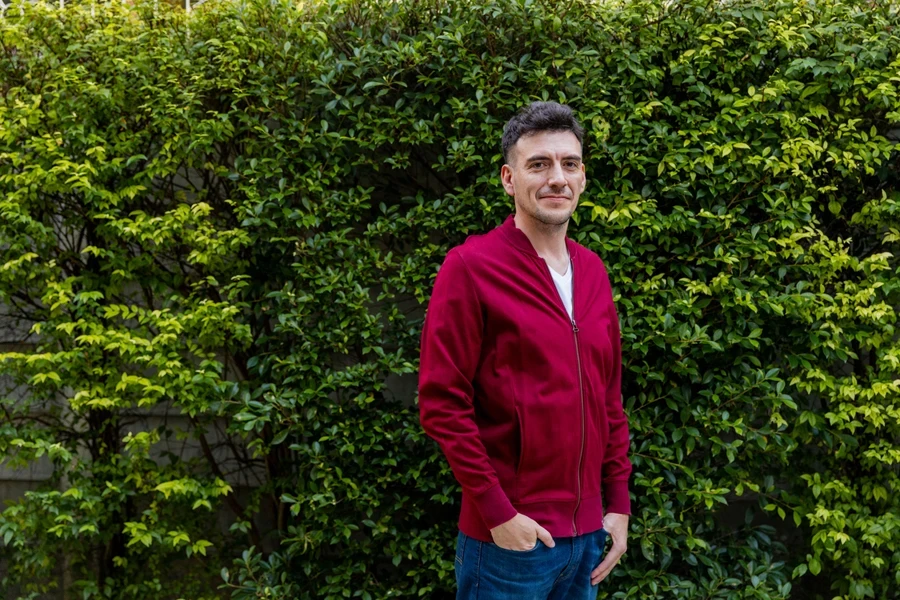 Man rocking a red zip-up cardigan