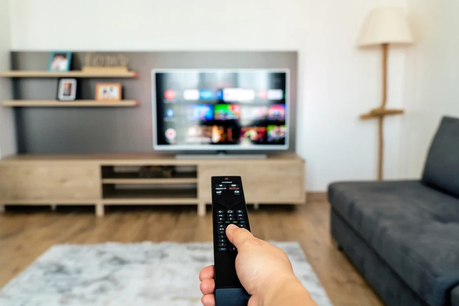 Man watching TV at home