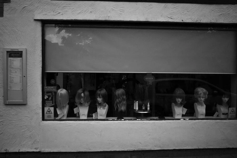 Mannequins showcasing different hair extensions