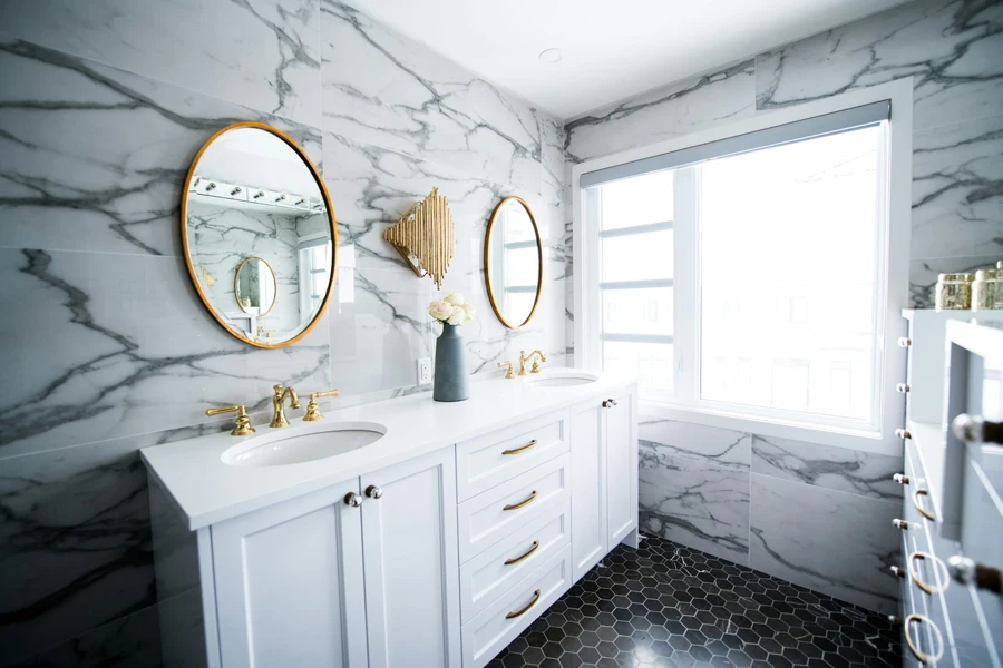 Marble and tiles covering floor, walls, and vanity