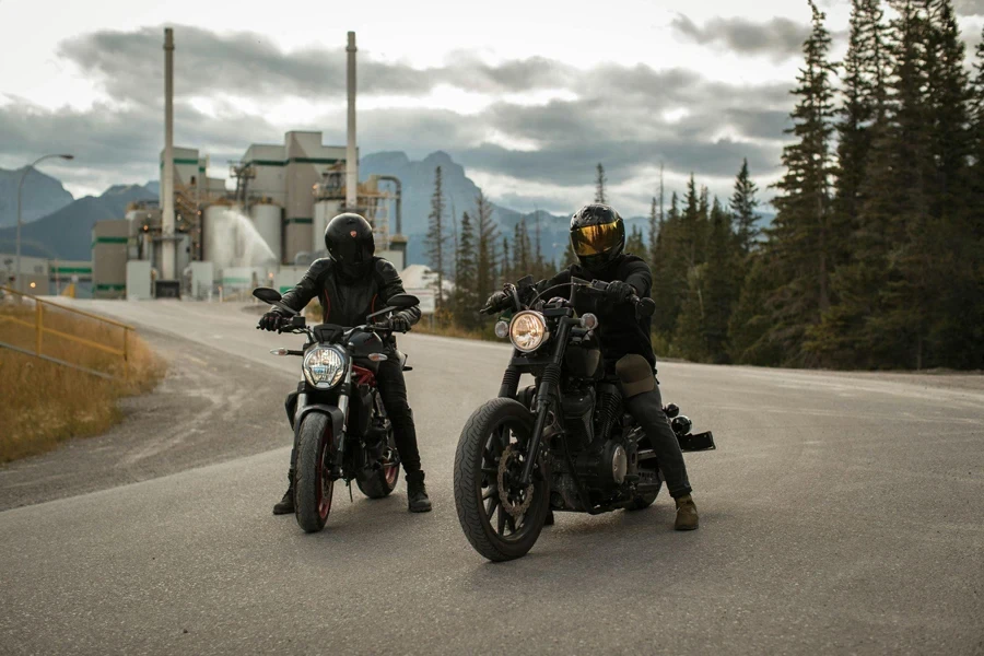 Men riding motorcycle