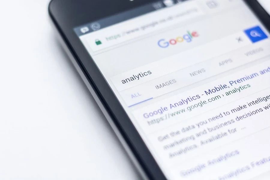 Mobile phone screen with a Google search about analytics