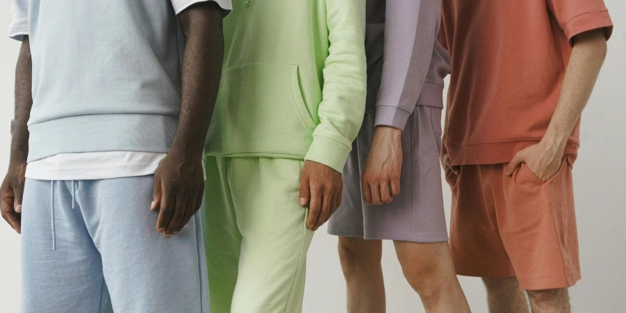 Models Wearing Sweatshirts and Shorts in Variety of Colors